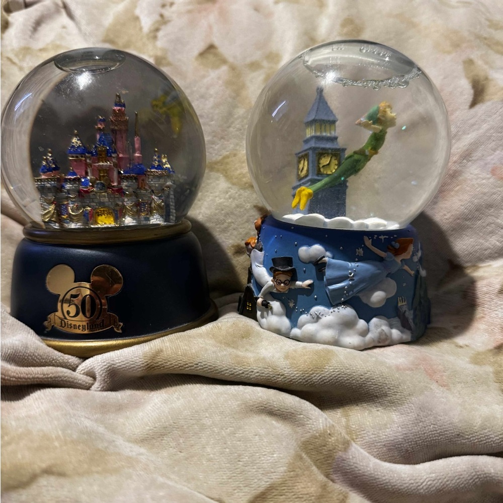 Disney Magical Snow Globe Duo with Castle and Peter Pan